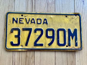 Older Yellow Background Nevada License Plate