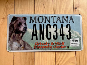 Montana Grizzly and Wolf Disc Center License Plate