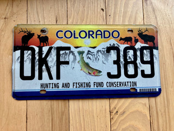 Colorado Hunting and Fishing Fund License Plate- Some Scratches/ Dent Under the Letter K