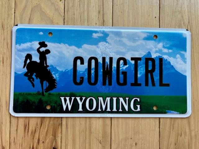 2017 Base University of Wyoming Booster License Plate - Cowgirl