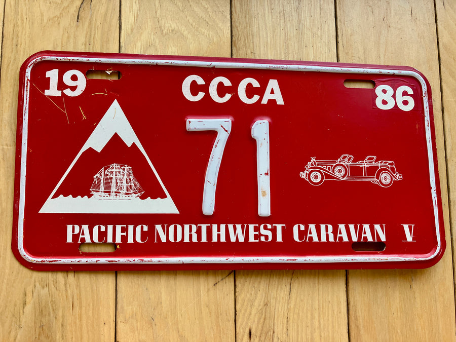 1986 Pacific Northwest Caravan Booster License Plate