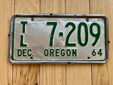 1964 Oregon Light Trailer License Plate W/Frame (Note the Cut In The Middle)