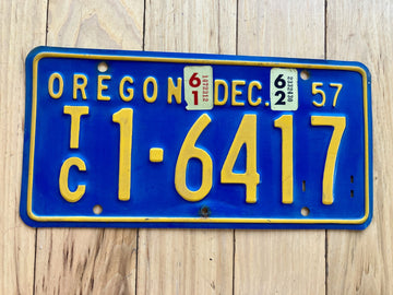 1957 Oregon Trailer Coach License Plate With A 1961 and 1962 Tab