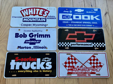 6 Chevy Booster License - Mix of Plastic and Metal - All at least 2019 and Older