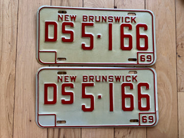 Pair of 1969 New Brunswick Dominion Service License Plates