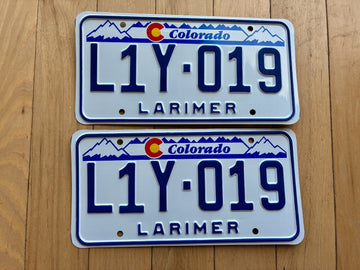 Pair of 1989 Base Larimer Colorado License Plates