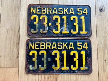 Pair of 1954 Nebraska License Plates (Rusted/Missing Corners)