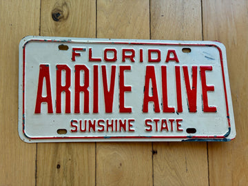 1970s Florida Arrive Alive License Plate
