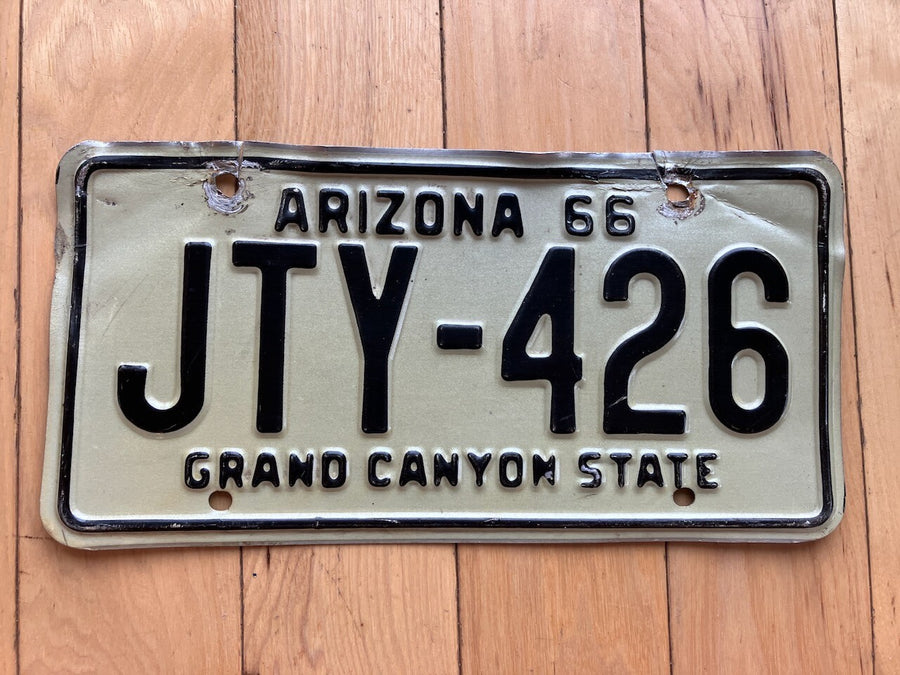 1966 Arizona License Plate -Damage Around Bolt Holes - MVD YOM Clear