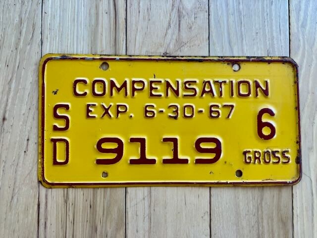 1967 South Dakota Compensation License Plate